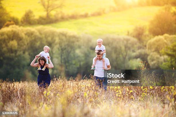 Family Enjoying Life Together Outside Stock Photo - Download Image Now - Adult, Baby - Human Age, Boys