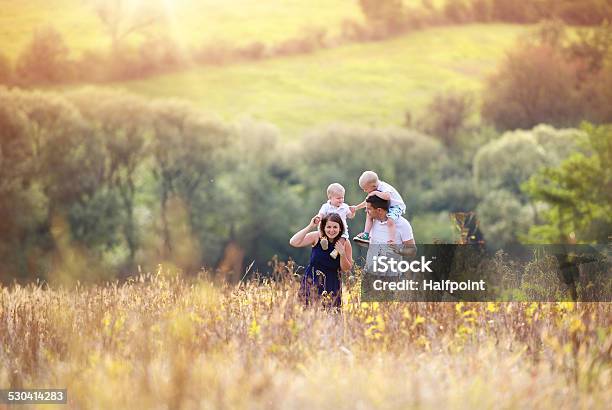 Family Enjoying Life Together Outside Stock Photo - Download Image Now - Adult, Baby - Human Age, Boys