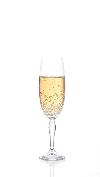 istock Champagne in a glass. Isolated on white background 530414371