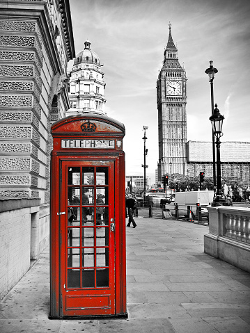 Red telephone box and Big Ben in London, UK.
