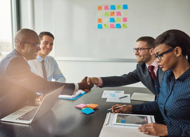 istock Multiracial team concluding a business agreement 530417054