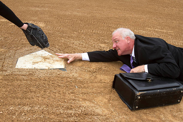 Businessman Sliding for Home