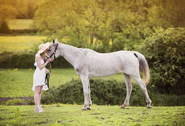 istock Woman with horse 530418385