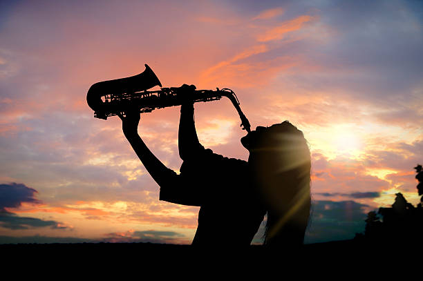 istock girl playing the saxophone 530419058