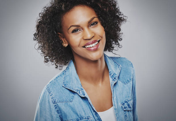 istock Gorgeous smiling woman in blue denim 530420046