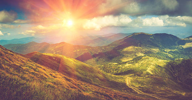 istock Beautiful panoramic mountain landscape at sunset. 530420266