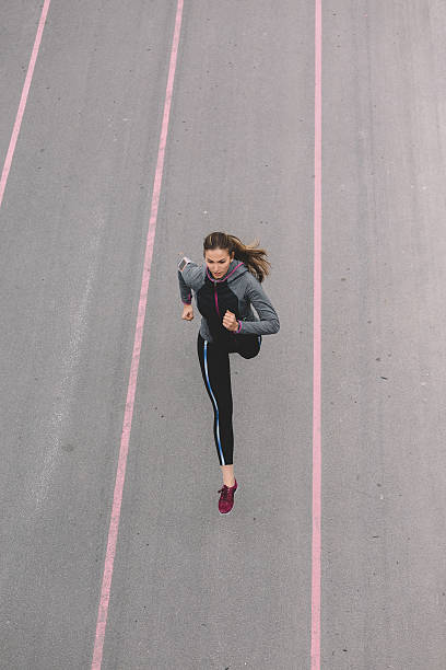 istock Sports woman jogging outside 530420530