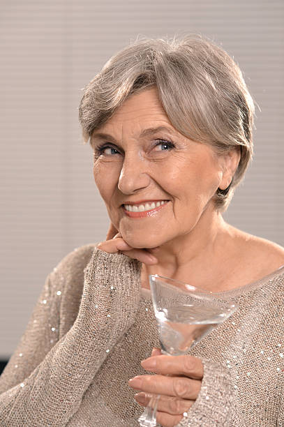 istock elderly woman in gray 530420592