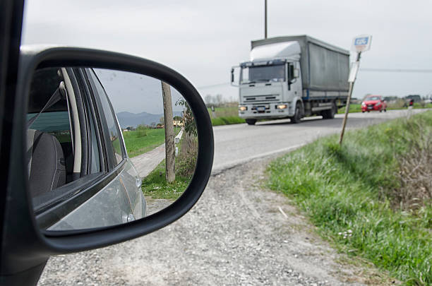 istock Dirt road seen from the mirror 530422022