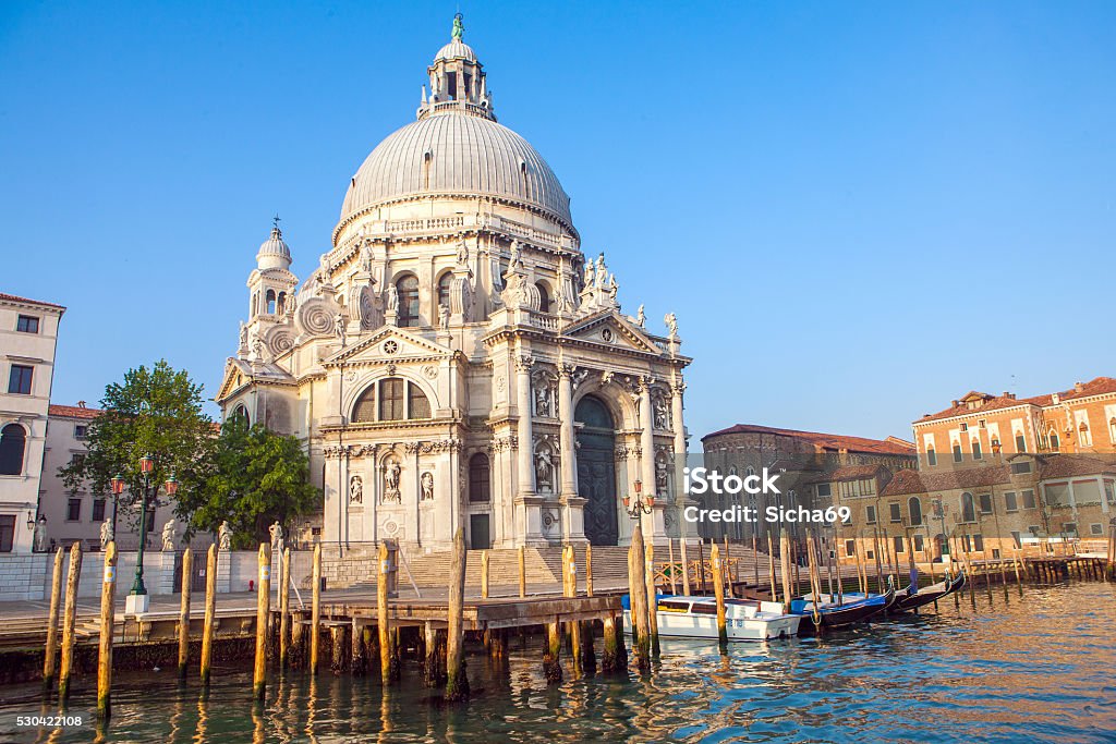 Basilica Santa Maria della Salute, Venice, Italy Basilica Santa Maria della Salute on embankment of Canal Grande in Venice, Italy Architecture Stock Photo