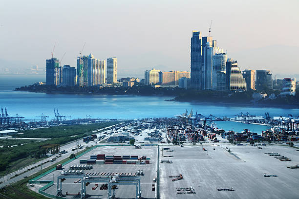 istock cranes at the container port terminal 530422559
