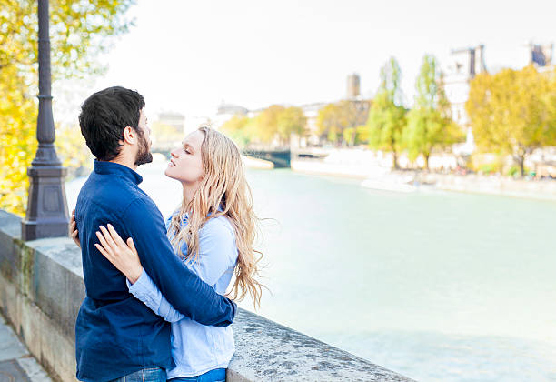 istock Loving Couple Romance At The Riverbank 530422878