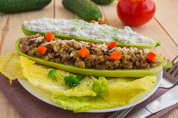 istock Baked stuffed zucchini, and vegetables.Dietary lunch. 530423630