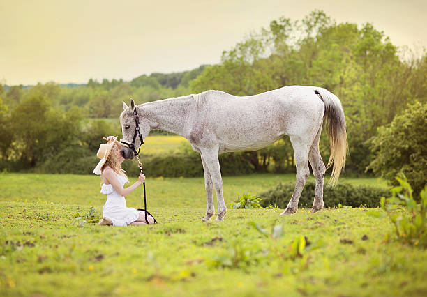 istock Woman with horse 530424303
