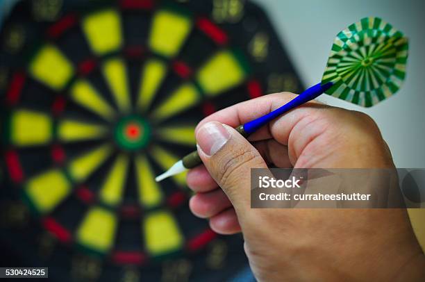 Darts Arrows In The Target Center Darts Game Stock Photo - Download Image Now - Accuracy, Achievement, Aiming