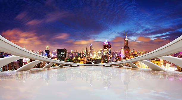 istock futuristic business perspective and cityscape at night 530426655