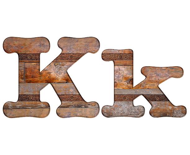 istock Letter K wooden and rusty metal. 530426919