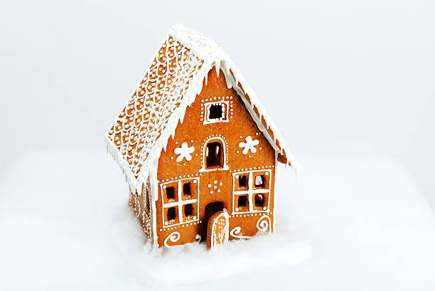 istock The hand-made eatable gingerbread house and snow decoration 530427127
