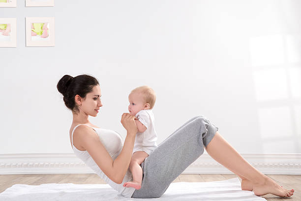 Mère et bébé gymnastique - Photo