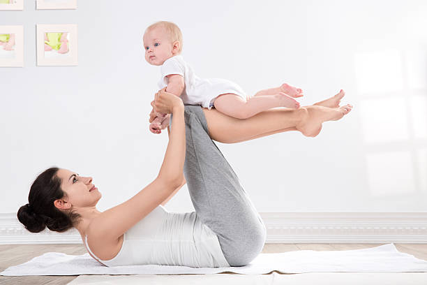 Mère et bébé gymnastique - Photo