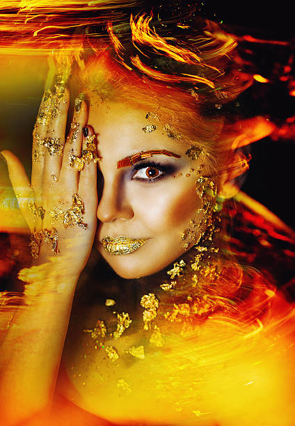 istock Woman with golden make-up 530428531