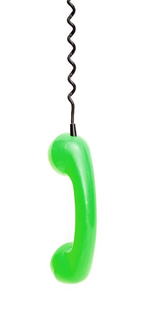 istock Green retro telephone tube isolated on white background. 530430886
