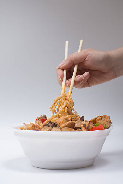 istock Chinese noodles with a chicken and vegetables 530431876