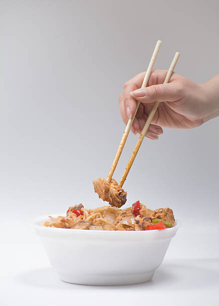 istock Chinese noodles with a chicken and vegetables 530432288