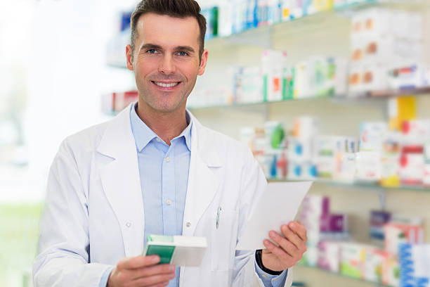 istock Pharmacist filling prescription in pharmacy 530433250