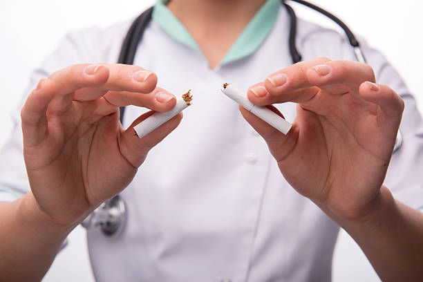 istock woman doctor in white smock 530435033
