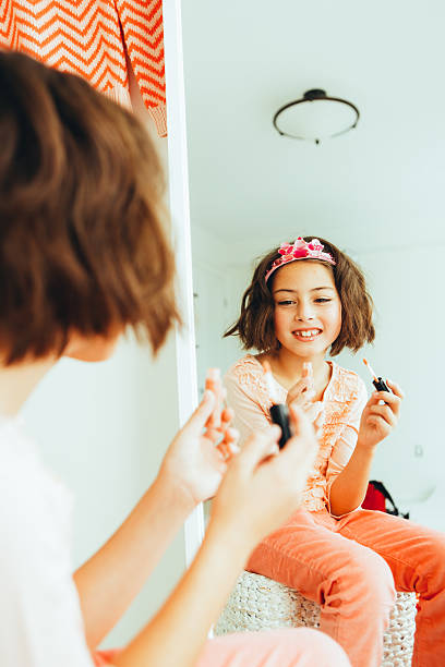 istock Girl in front of the mirror 530436150
