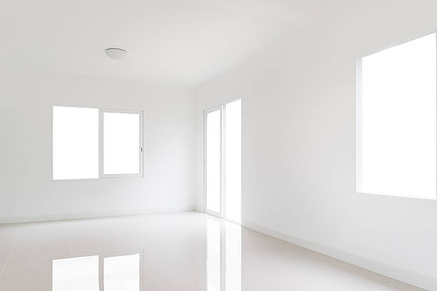 istock White room with a door and windows 530436180
