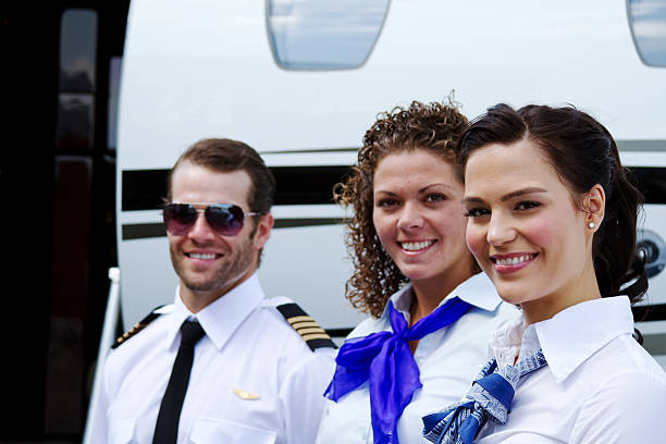 istock Profile of pilot and stewardesses 530436221