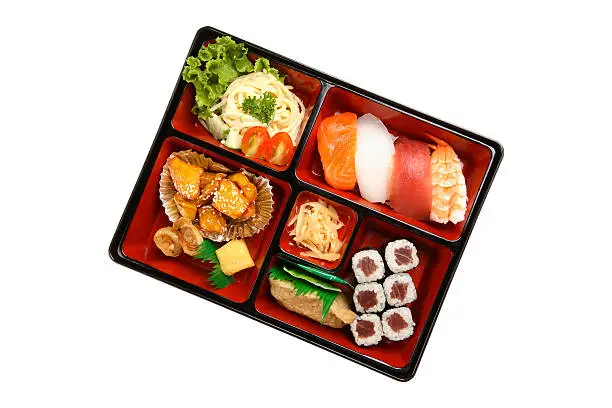 Bento box with sushi isolated on white background