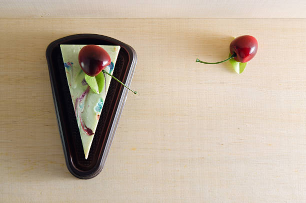 Fancy soap in cake form with cherry on the top