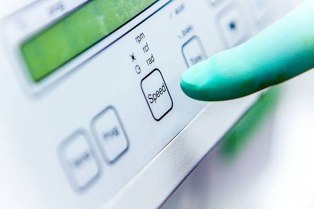 istock Finger Adjusting Speed on Centrifuge 530437269