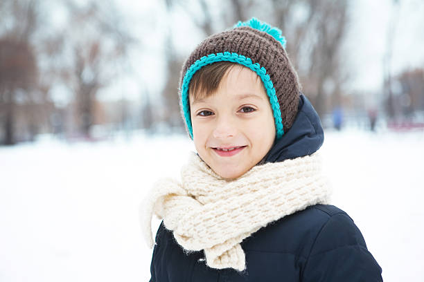 istock Little boy in the winter park 530438047
