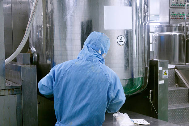 istock Technician check manufacture equipment and reactors in pharmacy factory 530438971