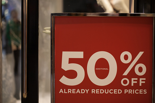 50% off sales sign reads 
