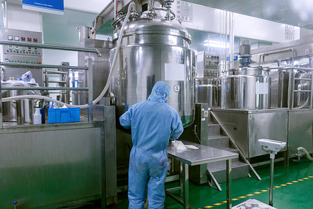 istock Technician check manufacture equipment and reactors in pharmacy factory 530438981