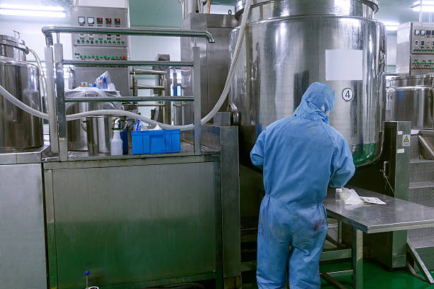 istock Technician check manufacture equipment and reactors in pharmacy factory 530438983