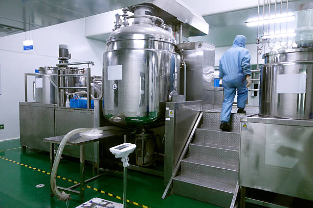 istock Technician check manufacture equipment and reactors in pharmacy factory 530438989