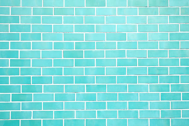 istock Turquoise new brick wall perfectly background 530441212