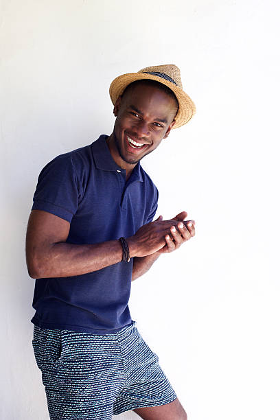 istock Cheerful young man standing against white background 530441286