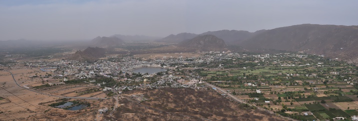 Panorama shot - Bird eye view of Pushkar City - Rajasthan - India, Holy Hindu City. It is a sacred pilgrimage destination for Hindus