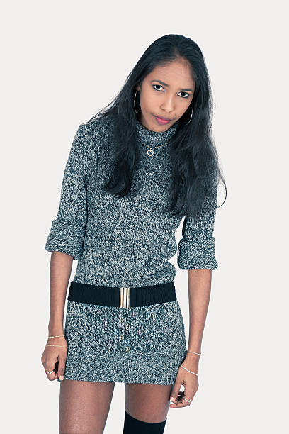 Beautiful woman doing different expressions in different sets of clothes Beautiful woman doing different expressions in different sets of clothes: sad embarrassment skirt photos stock pictures, royalty-free photos & images