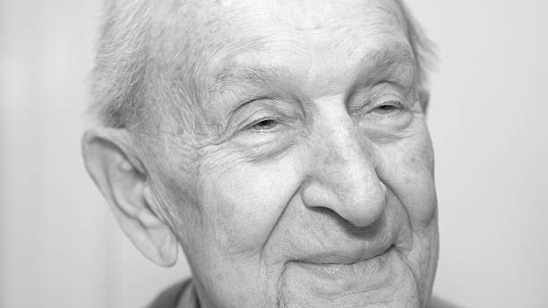 istock Senior man looking to one side close-up monochrome 530448395