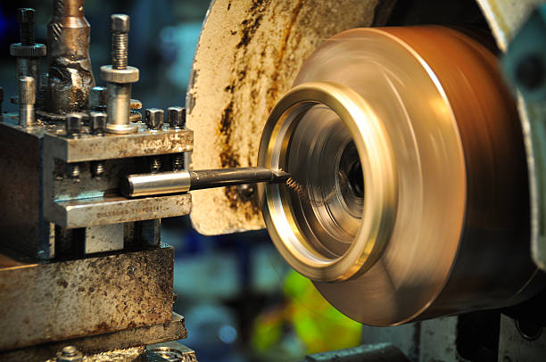 istock lathe machine in a workshop, Part of the lathe. 530449197