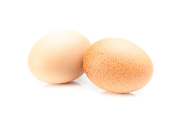 istock eggs isolated on white and gray background 530449641