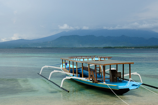 Tourist boat on Gili islands near the Bali island. The most populat tourist destination in Indonesia, Nusa tenggara.
